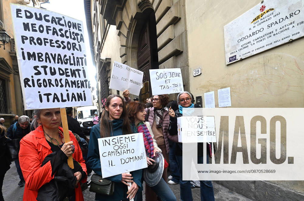 In front of the Machiavelli High School on Via Santo Spirito, a group of teachers held an open lesson on the street with megaphones and signs, addressing students leaning out of their windows and standing in front of the occupied school s door. Florence, October 23, 2026 Florence Italy - ZUMAa289 20261023_zia_a289_128
