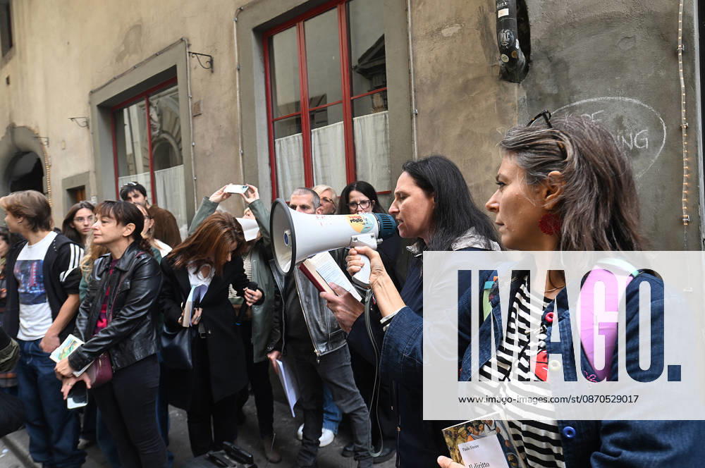 In front of the Machiavelli High School on Via Santo Spirito, a group of teachers held an open lesson on the street with megaphones and signs, addressing students leaning out of their windows and standing in front of the occupied school s door. Florence, October 23, 2026 Florence Italy - ZUMAa289 20261023_zia_a289_132
