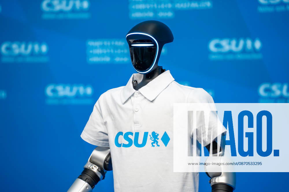 Munich, Bavaria, Germany October 23, 2026: The 2026 party convention of the CSU (Christian Social Union) at the Munich Trade Fair Center. The Unitree G1 humanoid robot from the Chinese manufacturer Unitree Robotics, wearing a white CSU polo shirt