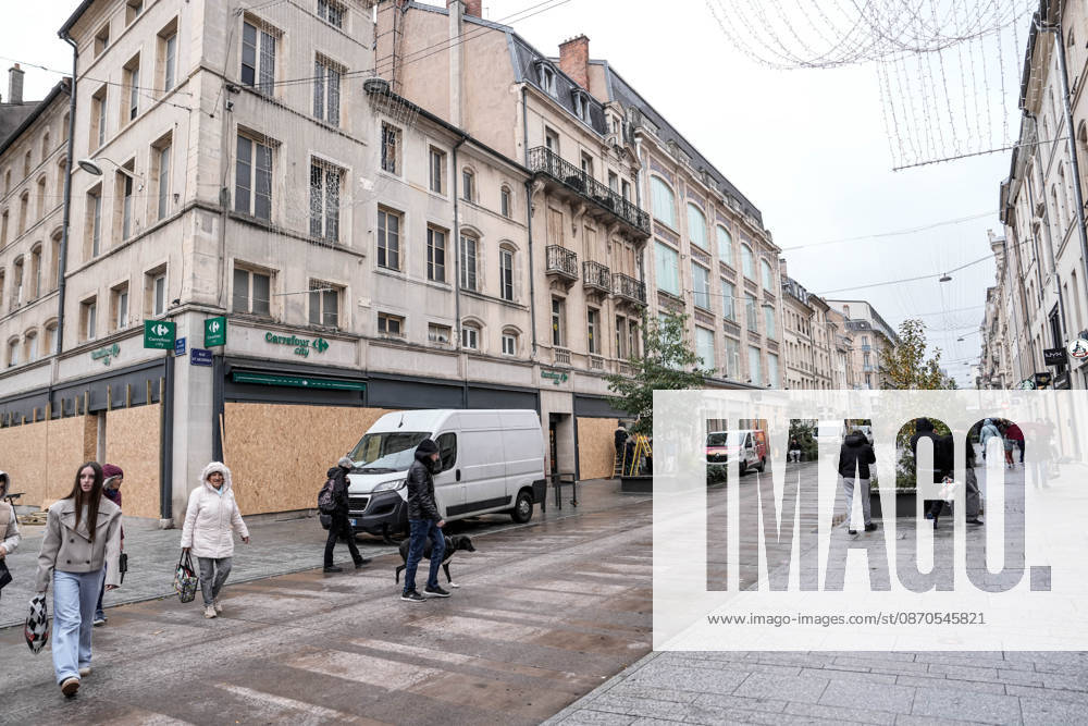 Shopfronts boarded up in Nancy ahead of planned protests NANCY, FRANCE - OCTOBER 23: Workers install protective wooden boards and plywood panels over shopfronts and commercial venues across downtown Nancy, France, on October 23, 2026. Local business owners and municipal authorities reinforced physical security measures ahead of large-scale public demonstrations planned for October 24, seeking to prevent vandalism and structural damage along major commercial corridors. Muhammed Said Tako Anadolu Nancy France. Editorial use only. Please get in touch for any other usage.