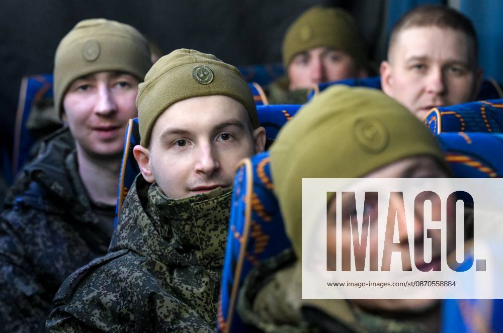 Belarus Russia Ukraine Military Operation POWs Exchange 9271489 23.10.2026 Russian prisoners of war, released from Ukrainian captivity amid Russia s military operation in Ukraine, sit in a bus upon arrival at an airfield in Moscow region, Russia. Russia and Ukraine on October 23 completed a swap of 270 prisoners of war each. Ilya Pitalev Sputnik Moscow region Russia