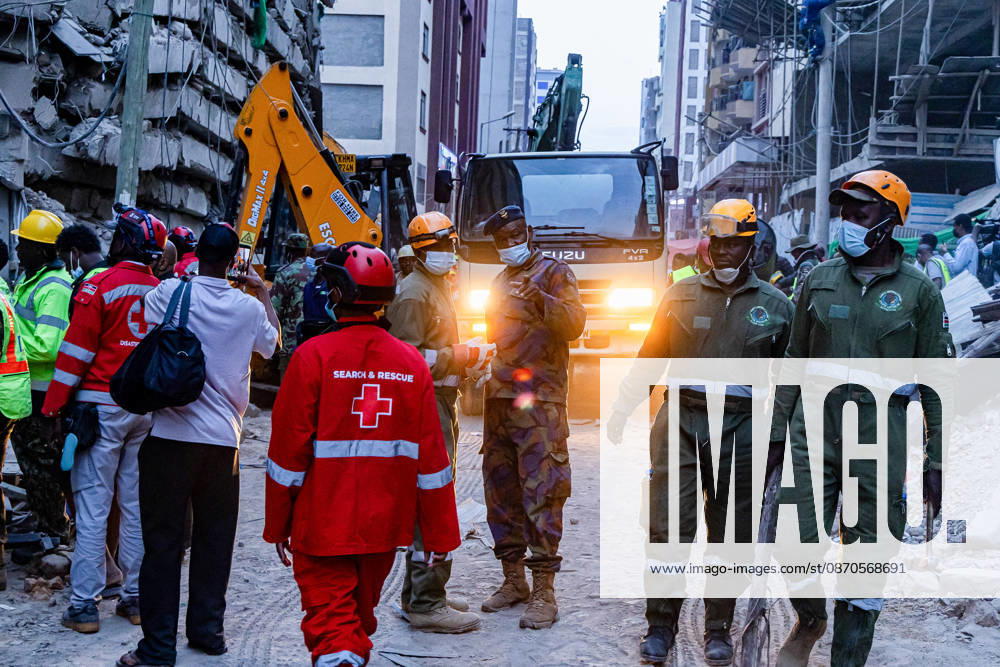 Emergency response personnel near the rubble of a collapsed multi-storey building under construction in Eastleigh as rescue operations continue. Rescuers from multiple emergency response agencies conduct search and rescue operations at the site of a collapsed multi-storey building under construction in Eastleigh, Nairobi, Kenya. An unconfirmed number of people are feared trapped beneath the rubble. Nairobi Kenya - ZUMAs197 20261023_aaa_s197_286