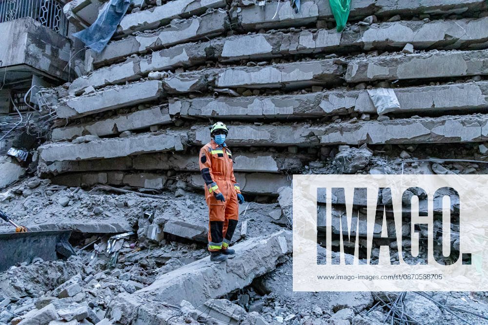 A rescuer stands on the rubble of a collapsed multi-storey building under construction in Eastleigh as search and rescue operations continue. Rescuers from multiple emergency response agencies conduct search and rescue operations at the site of a collapsed multi-storey building under construction in Eastleigh, Nairobi, Kenya. An unconfirmed number of people are feared trapped beneath the rubble. Nairobi Kenya - ZUMAs197 20261023_aaa_s197_296