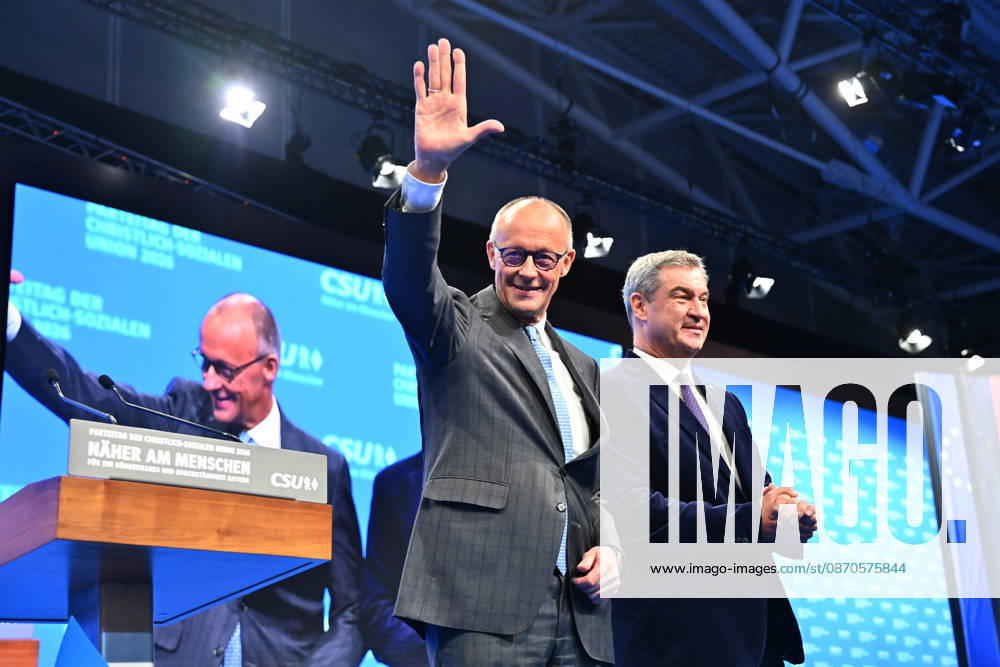 Chancellor Friedrich MERZ and Markus SOEDER, Minister-President of Bavaria and CSU Chairman, on the podium at the 2026 CSU Party Convention on October 23 and 24, 2026, at the Munich Trade Fair Grounds
