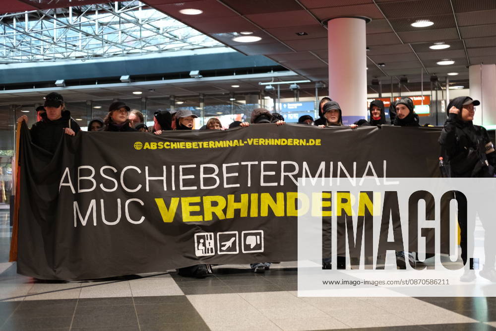 Protest at Munich Airport against planned deportation terminal MUNICH, GERMANY - OCTOBER 24: Protesters carry banner reading Abschiebeterminal MUC verhindern (Stop the MUC Deportation Terminal) inside a terminal building during a demonstration against a planned deportation terminal at Munich Airport in Munich, Germany on October 24, 2026. The campaign, backed by migrant rights groups, opposes federal plans to process deportations at a new facility to be built at the airport from 2028. Merve Goettl Anadolu Munich Germany. Editorial use only. Please get in touch for any other usage.