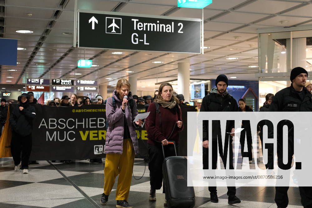 Protest at Munich Airport against planned deportation terminal MUNICH, GERMANY - OCTOBER 24: Protesters march through Munich Airport s terminal with a banner reading Stop the MUC Deportation Terminal visible behind the group in Munich, Germany on October 24, 2026. The demonstration targets a planned deportation terminal the federal government intends to operate at the airport from 2028. Merve Goettl Anadolu Munich Germany. Editorial use only. Please get in touch for any other usage.
