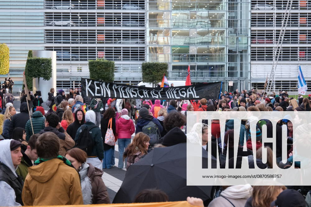 Protest at Munich Airport against planned deportation terminal MUNICH, GERMANY - OCTOBER 24: Protesters carry a large black banner reading Kein Mensch ist Illegal (No Human Is Illegal) during a demonstration against a planned deportation terminal outside the MAC Forum at Munich Airport in Munich, Germany on October 24, 2026. Germany s federal government plans to process deportations at the facility from 2028. Merve Goettl Anadolu Munich Germany. Editorial use only. Please get in touch for any other usage.