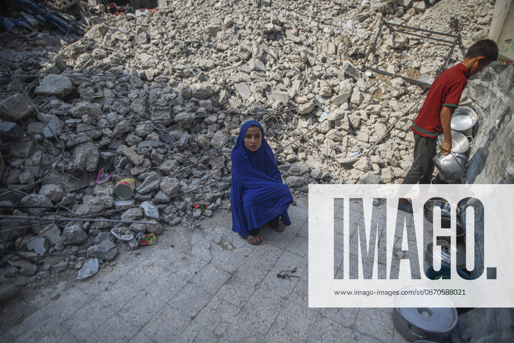 Gaza Palestinians Food Shortages 2026 A Palestinian child sits beside rubble from destroyed buildings while another child stands nearby in Jabalia Refugee Camp, northern Gaza Strip, Palestine, on October 24, 2026. The UN reports that damaged infrastructure, displacement and shortages of basic supplies continue to affect residents of Gaza, while funding shortages have reduced food assistance. Jabalia Gaza Strip Palestinian Territories