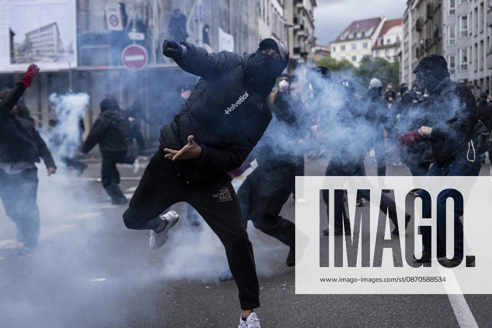 Demonstration and clashes between protesters and police in Strasbourg STRASBOURG, FRANCE - OCTOBER 24: Protesters clash with law enforcement officers during a demonstration in the city centre of Strasbourg, France on October 24, 2026. Police officers intervene to disperse groups of protesters as tear gas is deployed. Clashes, projectile throwing and property damage are reported in several streets. Barricades and burning vehicles reflect the tense situation surrounding the protest. Elyxandro Cegarra Anadolu Strasbourg France. Editorial use only. Please get in touch for any other usage.