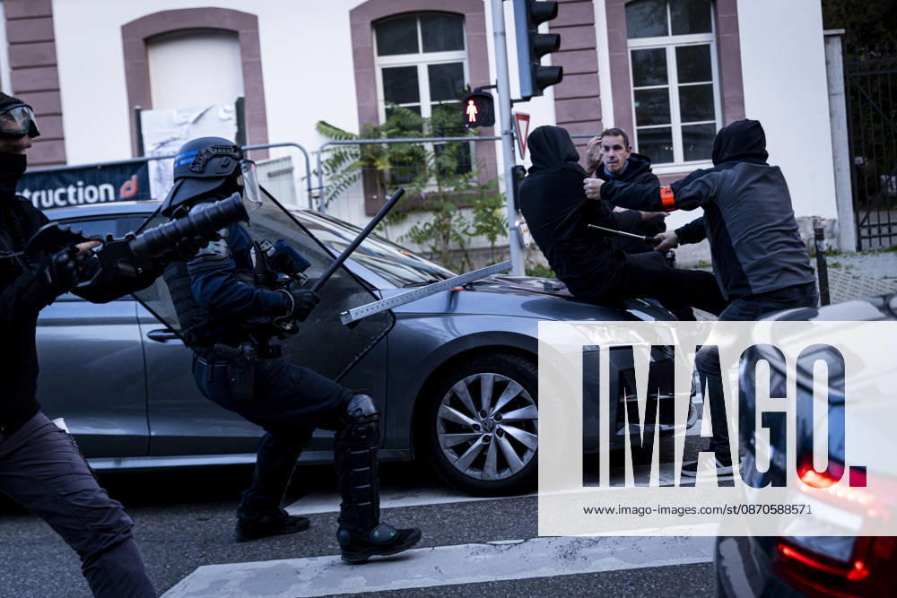 Demonstration and clashes between protesters and police in Strasbourg STRASBOURG, FRANCE - OCTOBER 24: Protesters clash with law enforcement officers during a demonstration in the city centre of Strasbourg, France on October 24, 2026. Police officers intervene to disperse groups of protesters as tear gas is deployed. Clashes, projectile throwing and property damage are reported in several streets. Barricades and burning vehicles reflect the tense situation surrounding the protest. Elyxandro Cegarra Anadolu Strasbourg France. Editorial use only. Please get in touch for any other usage.