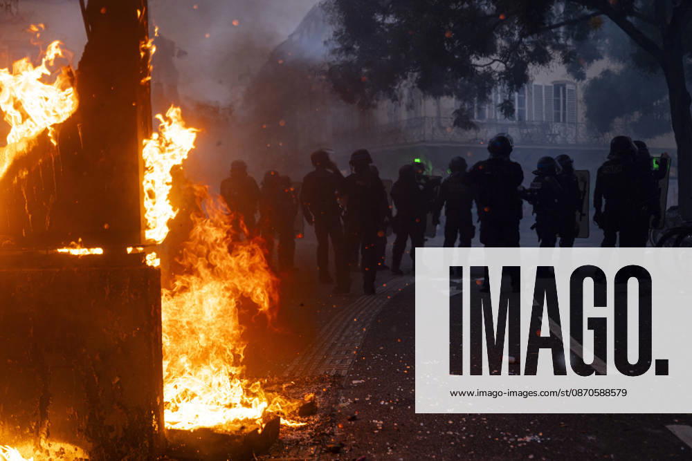 Demonstration and clashes between protesters and police in Strasbourg STRASBOURG, FRANCE - OCTOBER 24: Protesters clash with law enforcement officers during a demonstration in the city centre of Strasbourg, France on October 24, 2026. Police officers intervene to disperse groups of protesters as tear gas is deployed. Clashes, projectile throwing and property damage are reported in several streets. Barricades and burning vehicles reflect the tense situation surrounding the protest. Elyxandro Cegarra Anadolu Strasbourg France. Editorial use only. Please get in touch for any other usage.