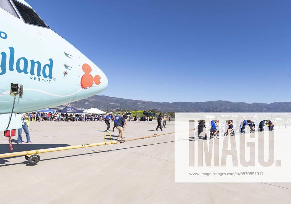 Teams compete in the 5th annual Alpha Resource Center Plane Pull, trying to pull a 140,000-pound Alaska Airlines 737 jetliner 20 feet in the fastest time. The event is a fundraiser for the Alpha Resource Center, a nonprofit serving people with disabilities and their families. Santa Barbara USA - ZUMAh13_ 20261024_zaf_h13_005