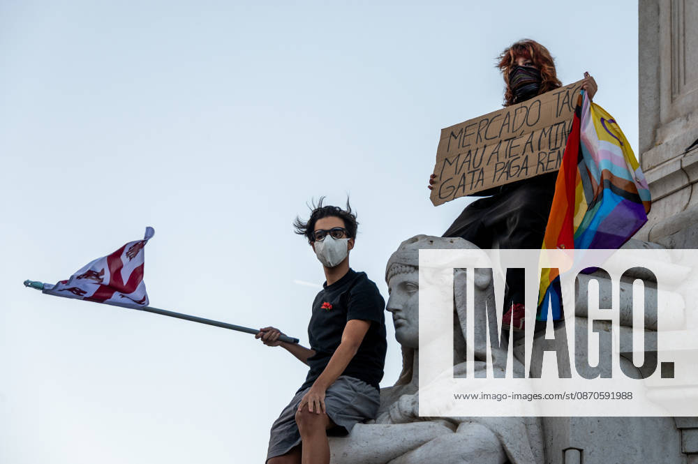 Demonstrators take part in a protest organized by the Acampada de Lisboa housing movement, demanding affordable housing, limits on rising rents and an end to property speculation. The march takes place in central Lisbon, from Marques de Pombal to Rossio Square, following recent police removal of protest tents and the detention of 55 demonstrators during housing protests in the Portuguese capital. Lisbon Portugal - ZUMAr238 20261024_zip_r238_069