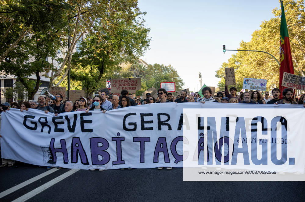 Demonstrators take part in a protest organized by the Acampada de Lisboa housing movement, demanding affordable housing, limits on rising rents and an end to property speculation. The march takes place in central Lisbon, from Marques de Pombal to Rossio Square, following recent police removal of protest tents and the detention of 55 demonstrators during housing protests in the Portuguese capital. Lisbon Portugal - ZUMAr238 20261024_zip_r238_025