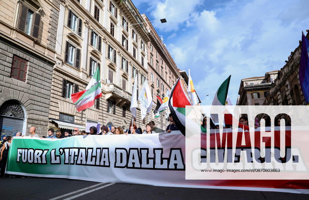 (261024) -- ROME, Oct. 24, 2026 -- Demonstrators are seen during an anti-war march in Rome, Italy, Oct. 24, 2026. Protests over rising living costs, military expansion and increased arms spending swept across several Italian cities on Saturday, with clashes between demonstrators and police reported in multiple locations. In Rome, demonstrators set off from Piazza della Repubblica, according to the ANSA news agency. Clashes erupted between protesters and police in the city center later in the evening, prompting police to use water cannons and tear gas in an attempt to disperse the crowds. ) ITALY-ROME-PROTESTS WangxKaiyan