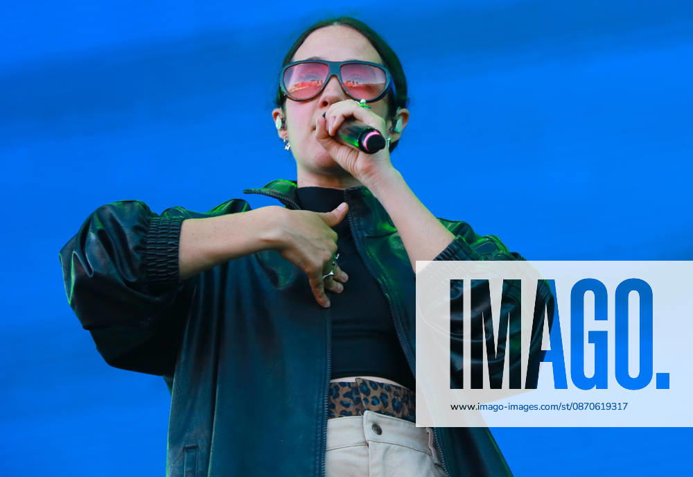 Mexican pop artist XIMENA SARINANA sings into a microphone while performing on stage in a black jacket and sunglasses during the Tecate Peninsula 2026 festival at Explanada Estadio Caliente in Tijuana, Baja California, Mexico, October 24, 2026. Tijuana Mexico - ZUMAm311 20261024_zip_m311_004