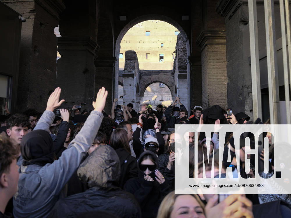 Rome Anti War Protest Demonstrators gather beneath an archway during an anti-war protest in Rome, Italy on October 24, 2026. Demonstrators took part in an anti-war march under the slogan Keep Italy Out of the War . Protesters further voiced opposition to Italy s involvement in armed conflicts, military rearmament and government policies. Rome Lazio Italy