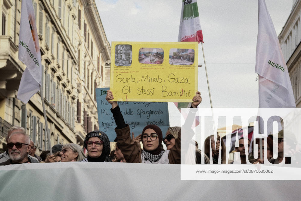 Rome Anti War Protest A demonstrator holds a sign reading Gorla, Minab, Gaza The Same Children during an anti-war protest in Rome, Italy on October 24, 2026. Demonstrators took part in an anti-war march under the slogan Keep Italy Out of the War . Protesters further voiced opposition to Italy s involvement in armed conflicts, military rearmament and government policies. Rome Lazio Italy