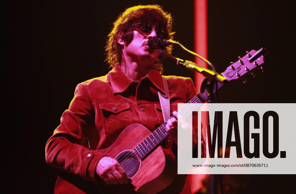 Mexican indie pop artist SIDDHARTHA performs on an acoustic guitar while singing at the microphone during his live concert at the Tecate Peninsula 2026 music festival at Explanada Estadio Caliente in Tijuana, Baja California, Mexico, October 24, 2026. Tijuana Mexico - ZUMAm311 20261024_zip_m311_009