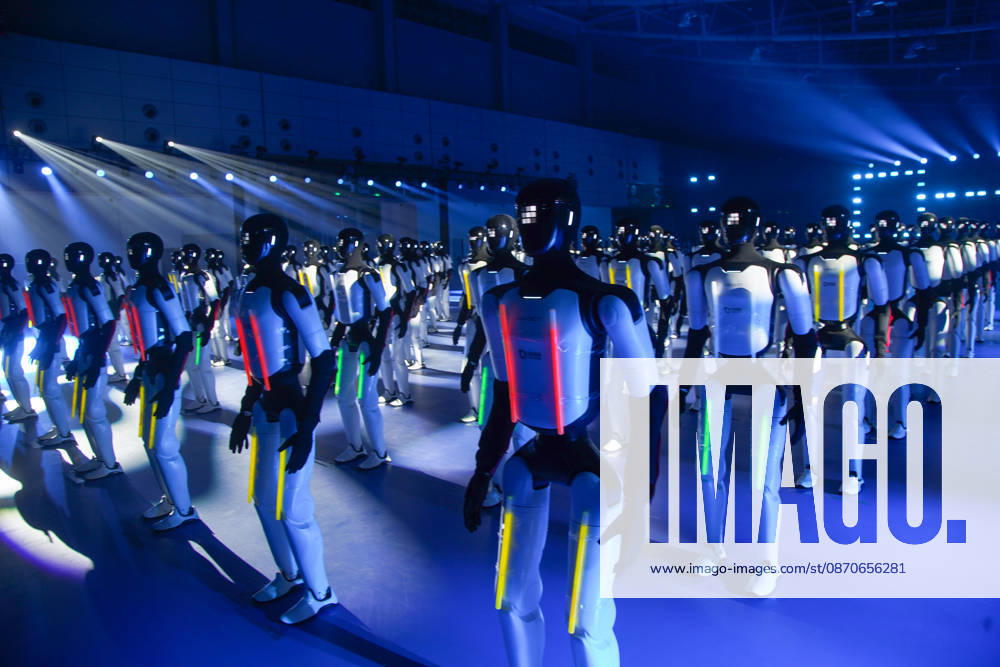 110 domestic humanoid robots perform a synchronized dance to challenge for the Guinness World Record for most robots dancing simultaneously at Jinan Huanghe International Convention and Exhibition Center on October 24, 2026 in Jinan, Shandong Province of China.