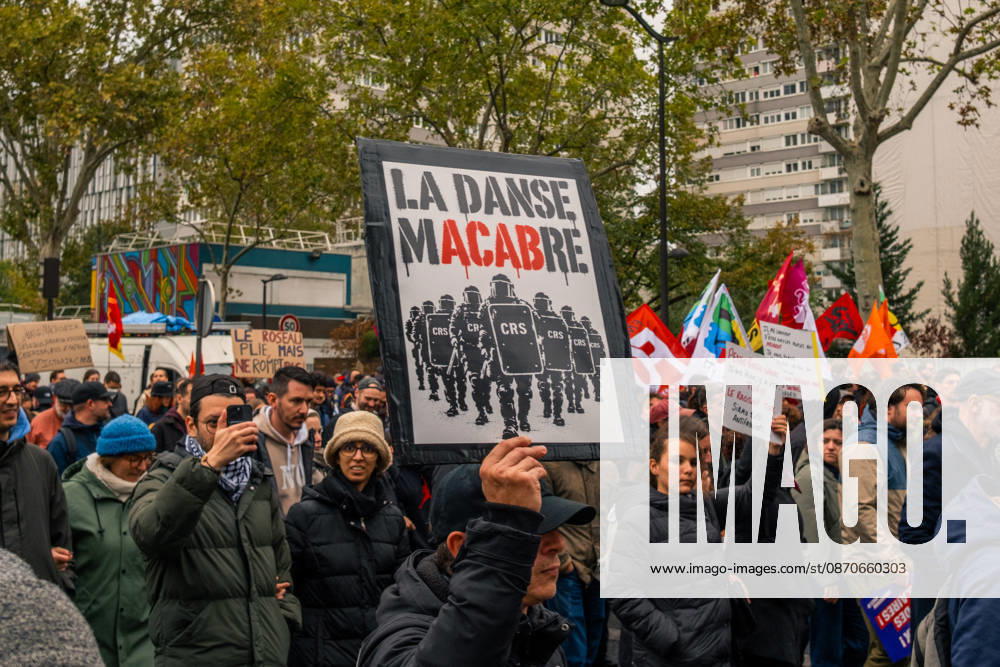 Yellow Vests Protest Act II - Paris Demonstrators carry placards displaying political messages during a march against the rising cost of living and for social justice in Paris, France, on October 24, 2026. The protest follows the boulevards des Maréchaux from Porte d’Italie to Porte de Vincennes, with calls for higher wages and better funding for public services and education. Photo by Jules Bernard ABACAPRESS.COM Paris Île-de-France France