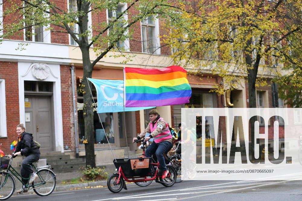Protesters ride with a rainbow flag on Charlottenstraße during Bike Pride in Potsdam, October 24, 2026 Bike Pride Potsdam