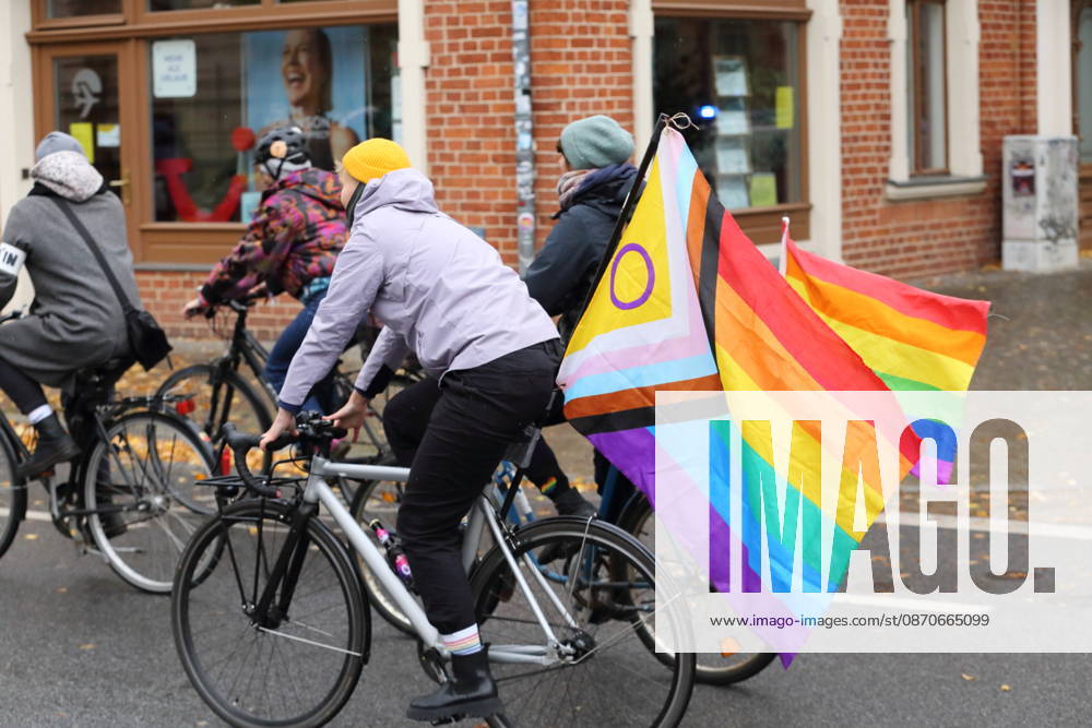 Protesters ride down Kurfürstenstraße waving rainbow flags during Bike Pride in Potsdam, October 24, 2026 Bike Pride Potsdam