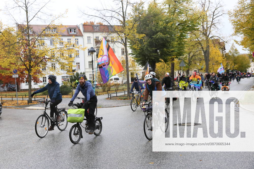 Protesters ride with a rainbow flag at Plantagenplatz in Babelsberg during Bike Pride in Potsdam, October 24, 2026 Bike Pride Potsdam