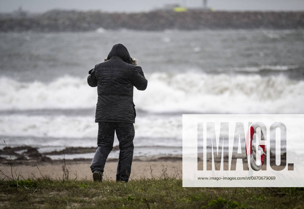 YSTAD, October 25, 2026: Storm watchers at Smabats Harbor in Ystad amid strong winds as Storm Boelo swept across southern Sweden on Sunday. YSTAD, SWEDEN