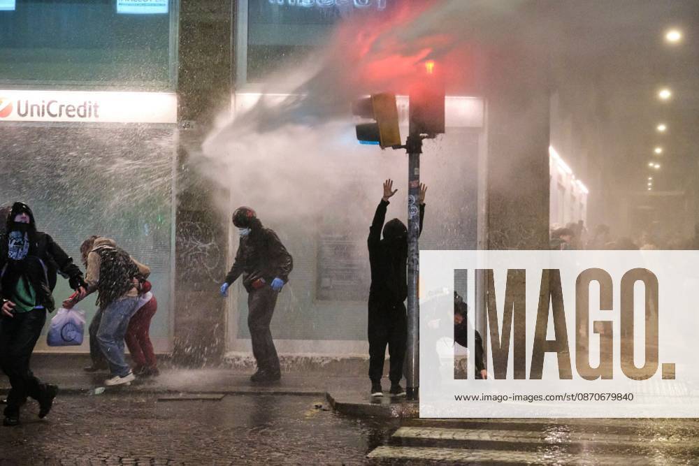 Thousands of people gathered spontaneously in Piazza del Nettuno before setting off in a march through the city centre. Clashes broke out along Via Marconi. Several people were injured, and a young man lost consciousness after being tackled by police. A police water cannon was also used from behind the protesters and hit the ambulance that was assisting the unconscious man. In protest, demonstrators sat down in front of the police line, which, after several minutes, decided to disband its wall of shields. Bologna Italy