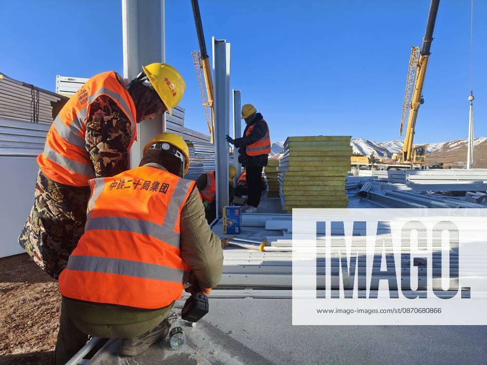 (261025) -- BAQEN, Oct. 25, 2026 () -- Rescuers from the China Railway 20th Bureau Group Corporation Limited build prefabricated houses at a quake-hit village in Gangchen Township of Baqen County, Nagqu City, southwest China s Xizang Autonomous Region, Oct. 25, 2026. Rescue and relief efforts continue after a 7.0-magnitude earthquake struck Baqen County of the city of Nagqu in southwest China s Xizang Autonomous Region, local authorities said Saturday. The roof panels of the first batch of prefabricated houses have been installed in Sunday afternoon in the quake-hit village in Gangchen Township of Baqen, and the laying of cables and the installation of doors and windows have been advanced successively. Currently, seven prefabricated houses