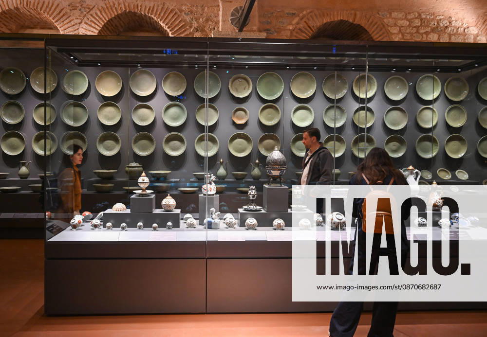 (261025) -- ISTANBUL, Oct. 25, 2026 -- Visitors view Chinese porcelain exhibits at the newly opened Porcelain Museum within the Topkapi Palace in Istanbul, T¨¹rkiye, Oct. 25, 2026. T¨¹rkiye on Saturday inaugurated a new museum district within Istanbul s historic Topkapi Palace, where thousands of Chinese porcelain pieces are on display, reflecting centuries of cultural exchanges between China and T¨¹rkiye. Restored into a historical neighborhood complete with its own streets and squares, the palace s former mint now houses the Porcelain Museum, which displays 5,300 pieces -- including 3,500 Chinese porcelains -- across 19 halls. Dating back to the 13th century, Chinese porcelains -- particularly those from Jingdezhen -- traveled a