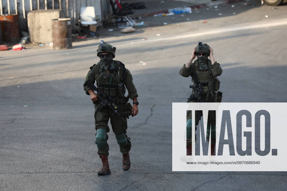 Strict security measures enforced in Hebron s Deir Bahha neighborhood HEBRON, WEST BANK, PALESTINE - OCTOBER 25: Israeli soldiers enforce strict security measures and maintain a military blockade in the Deir Bahha neighborhood of Hebron, West Bank, Palestine on October 25, 2026. The wide-scale military operation entered its third day following an armed attack at an Israeli military checkpoint in the Farsh al-Hawa area at the city s northwestern entrance on October 23, with troops sealing off roads and patrolling residential areas where the two Palestinian suspects involved in the incident lived. Wisam Hashlamoun Anadolu Hebron West Bank. Editorial use only. Please get in touch for any other usage.