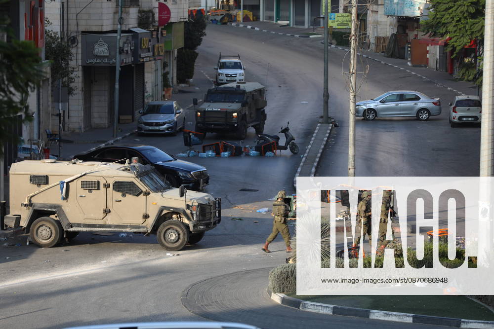 Strict security measures enforced in Hebron s Deir Bahha neighborhood HEBRON, WEST BANK, PALESTINE - OCTOBER 25: Israeli soldiers enforce strict security measures and maintain a military blockade in the Deir Bahha neighborhood of Hebron, West Bank, Palestine on October 25, 2026. The wide-scale military operation entered its third day following an armed attack at an Israeli military checkpoint in the Farsh al-Hawa area at the city s northwestern entrance on October 23, with troops sealing off roads and patrolling residential areas where the two Palestinian suspects involved in the incident lived. Wisam Hashlamoun Anadolu Hebron West Bank. Editorial use only. Please get in touch for any other usage.