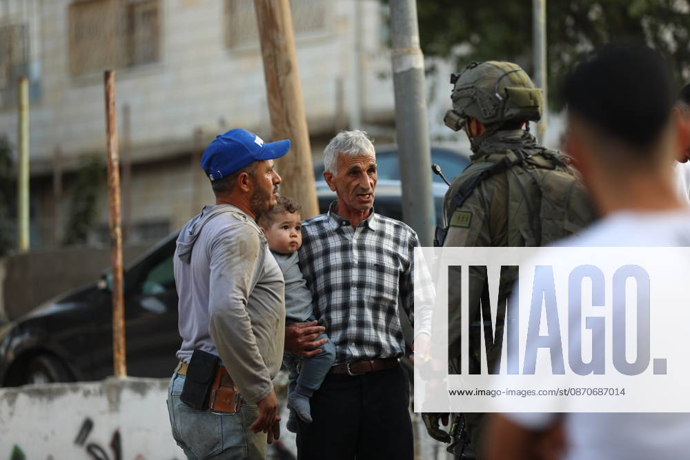 Strict security measures enforced in Hebron s Deir Bahha neighborhood HEBRON, WEST BANK, PALESTINE - OCTOBER 25: Israeli soldiers enforce strict security measures and maintain a military blockade in the Deir Bahha neighborhood of Hebron, West Bank, Palestine on October 25, 2026. The wide-scale military operation entered its third day following an armed attack at an Israeli military checkpoint in the Farsh al-Hawa area at the city s northwestern entrance on October 23, with troops sealing off roads and patrolling residential areas where the two Palestinian suspects involved in the incident lived. Wisam Hashlamoun Anadolu Hebron West Bank. Editorial use only. Please get in touch for any other usage.