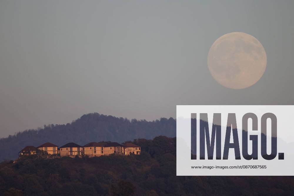 RUSSIA, SOCHI - OCTOBER 25, 2026: The full moon shines over the city. Dmitry Feoktistov TASS 99952604