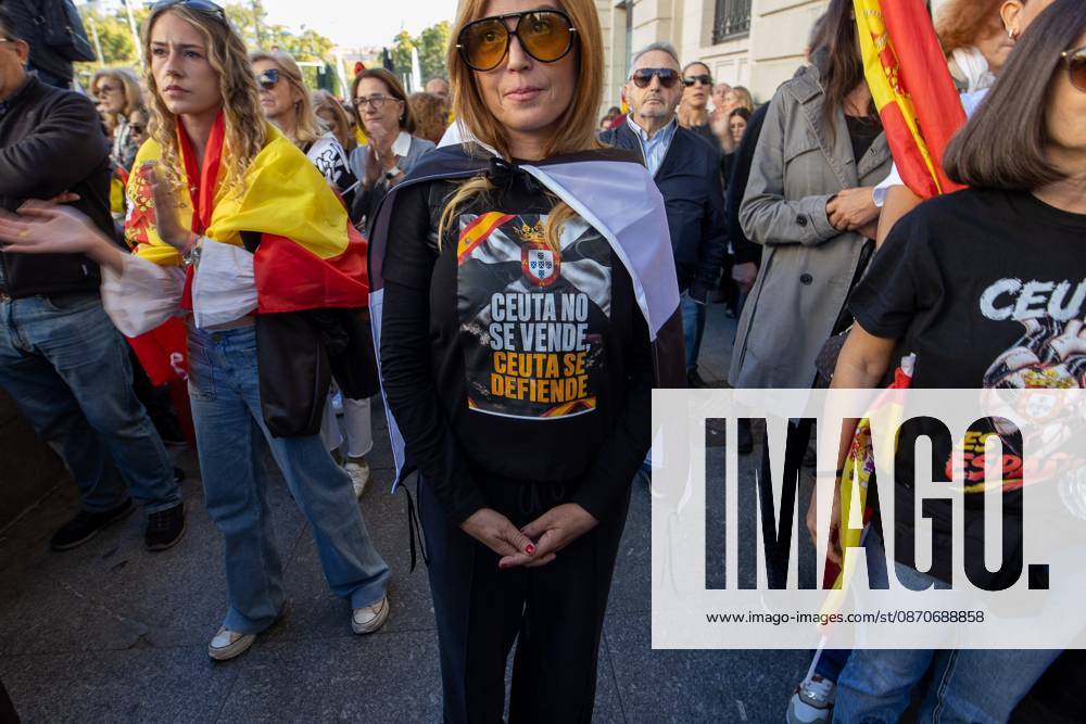 A woman wears a T-shirt in support of the autonomous city of Ceuta..Thousands of people in Madrid have rallied in support of the demands made by women from CeutaÃ¢â‚¬known locally as caballas Ã¢â‚¬who are calling for a return to normalcy in the autonomous city. Madrid Spain - ZUMAs197 20261025_aaa_s197_113