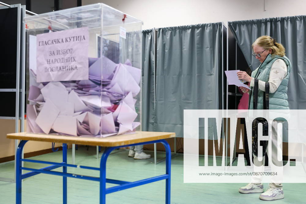 SERBIA, BELGRADE - OCTOBER 25, 2026: A woman casts her ballot at a polling station during the 2026 Serbian parliamentary election. On 25 October, the Serbs went to the polls to elect members of the country s unicameral parliament, Narodna Skupshtina Belgrade Serbia - ZUMAt113 20261025_zaa_t113_372