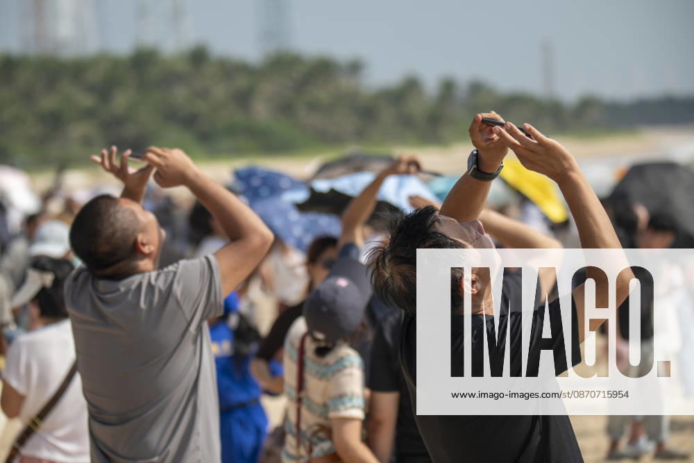Spectators take photos as a Long March-8A carrier rocket carrying the 28th group of low-orbit internet satellites blasts off from the Hainan Commercial Spacecraft Launch Site on October 25, 2026 in Wenchang, Hainan Province of China. The rocket lifted off at 10:03 a.m. (Beijing Time) from the Hainan commercial spacecraft launch site. The payloads, the 28th group of low-orbit internet satellites, entered the designated orbit.