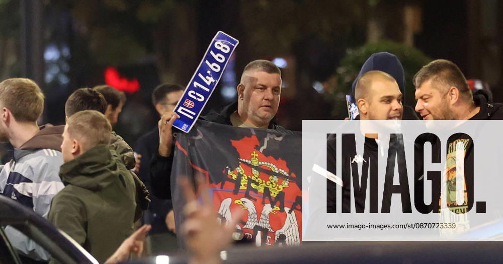 Belgrade(Serbia) Politics Life Reactions after the election results The fall of the totalitarian regime after 14 years and the change of government Man with police plates from a police vehicle in retreat