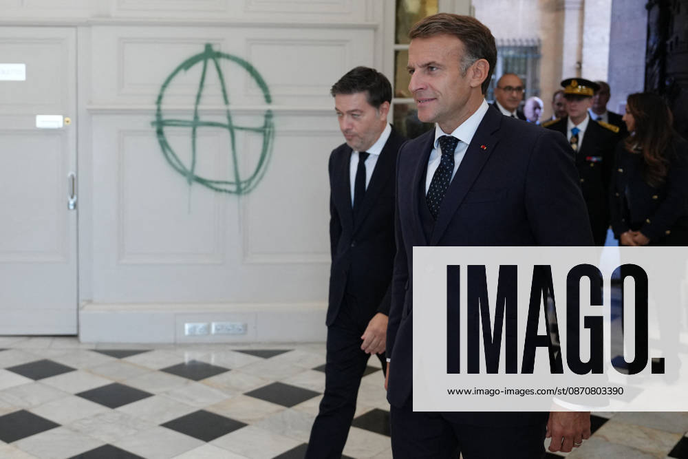 #2 President Macron visits Marseille a Week After the Riots - France French President Emmanuel Macron and Marseille Mayor Benoit Payan enter the city hall which was recently vandalized, in Marseille, France, Monday, October 26, 2026, during a visit to notice the return of republican order after the violence and looting that punctuated the citizen mobilization of October 17, 2026. Protests by high school students over learning conditions sparked a movement that has since spread nationwide, fuelled by broader anger over the rising cost of living. Photo by Aurelien Morissard Pool ABACAPRESS.COM Marseille France
