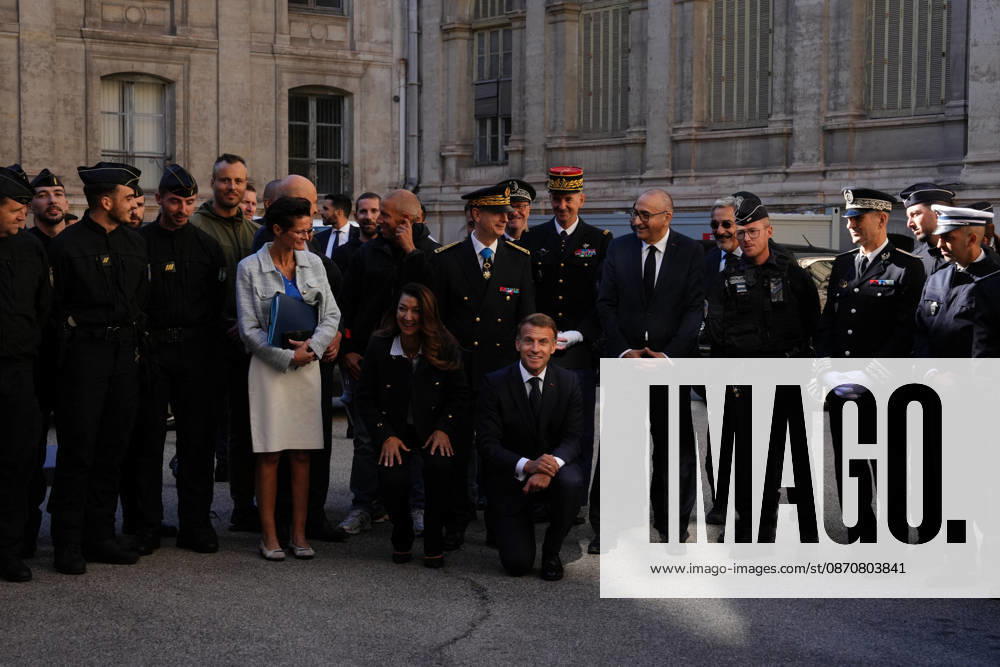 President Macron visits Marseille a Week After the Riots - France French President Emmanuel Macron poses with the police force at the prefecture in Marseille, France, Monday, October 26, 2026, during a visit to notice the return of republican order after the violence and looting that punctuated the citizen mobilization of October 17, 2026. Protests by high school students over learning conditions sparked a movement that has since spread nationwide, fuelled by broader anger over the rising cost of living. Photo by Aurelien Morissard Pool ABACAPRESS.COM Marseille France