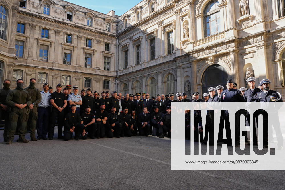 President Macron visits Marseille a Week After the Riots - France French President Emmanuel Macron poses with the police force at the prefecture in Marseille, France, Monday, October 26, 2026, during a visit to notice the return of republican order after the violence and looting that punctuated the citizen mobilization of October 17, 2026. Protests by high school students over learning conditions sparked a movement that has since spread nationwide, fuelled by broader anger over the rising cost of living. Photo by Aurelien Morissard Pool ABACAPRESS.COM Marseille France