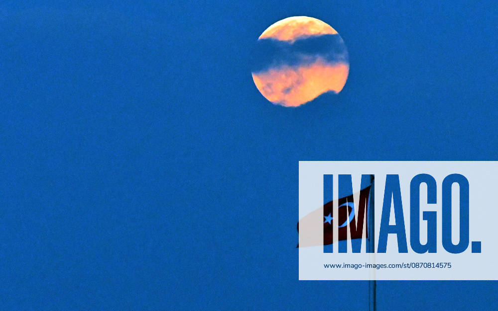 Full moon in Turkiye s Kars KARS, TURKIYE - OCTOBER 26: A full moon is seen alongside the Turkish flag in the Sarikamis district of Kars, Turkiye on October 26, 2026. Huseyin Demirci Anadolu Kars Turkey. Editorial use only. Please get in touch for any other usage.