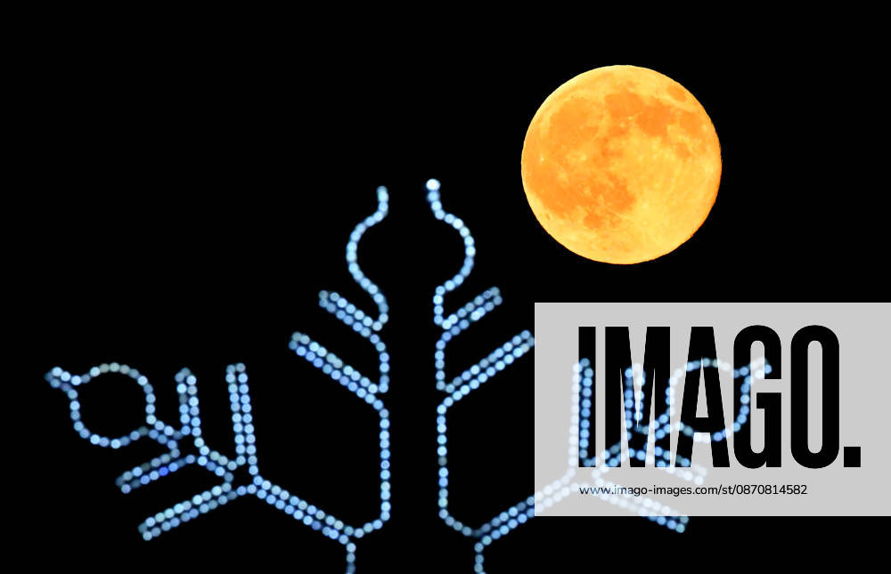 Full moon in Turkiye s Kars KARS, TURKIYE - OCTOBER 26: A full moon is seen alongside the street decorations in the Sarikamis district of Kars, Turkiye on October 26, 2026. Huseyin Demirci Anadolu Kars Turkey. Editorial use only. Please get in touch for any other usage.