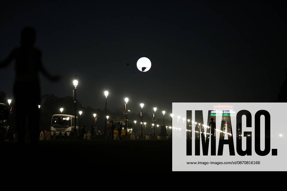 New Delhi under a full moon NEW DELHI, INDIA - OCTOBER 26, 2026: A view of the iconic India Gate in New Delhi, illuminated by the glow of the full moon that marks the beginning of the Sharad Purnima festival. The full moon symbolizes the start of this important Hindu festival, which celebrates the beginning of autumn and the arrival of the years greatest season of spiritual and agricultural abundance. New Delhi India