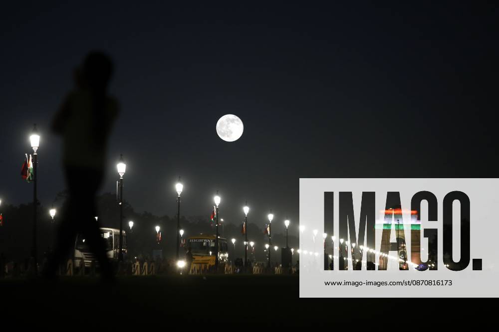 New Delhi under a full moon NEW DELHI, INDIA - OCTOBER 26, 2026: A view of the iconic India Gate in New Delhi, illuminated by the glow of the full moon that marks the beginning of the Sharad Purnima festival. The full moon symbolizes the start of this important Hindu festival, which celebrates the beginning of autumn and the arrival of the years greatest season of spiritual and agricultural abundance. New Delhi India