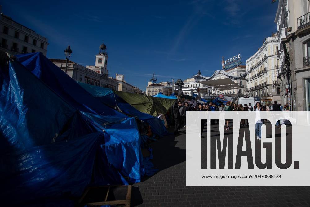 MADRID, SPAIN Ã¢â‚¬ OCTOBER 26, 2026: Madrid has reached one month of protests in La Puerta del Sol Square, where hundreds of activists fighting for the right to housing in Spain have been staying in tents set up on September 26 of this year. The protesters organized the occupation of the plaza in response to the eviction of Maricarmen Abascal, an 87-year-old woman who was removed from her home and later died at a hospital in Spain s capital. Madrid Spain - ZUMAq101 20261026_zna_q101_116