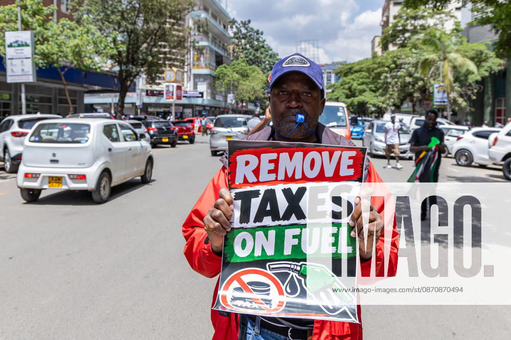 Protesters Demonstrate Against Rising Fuel Prices in Nairobi - 26 Oct 2026 Kenyan human rights activist holds a placard during the protest. Protesters demonstrated against rising fuel prices and the cost of living in Nairobi s Central Business District, calling for lower fuel prices and the removal of fuel taxes. Nairobi Kenya
