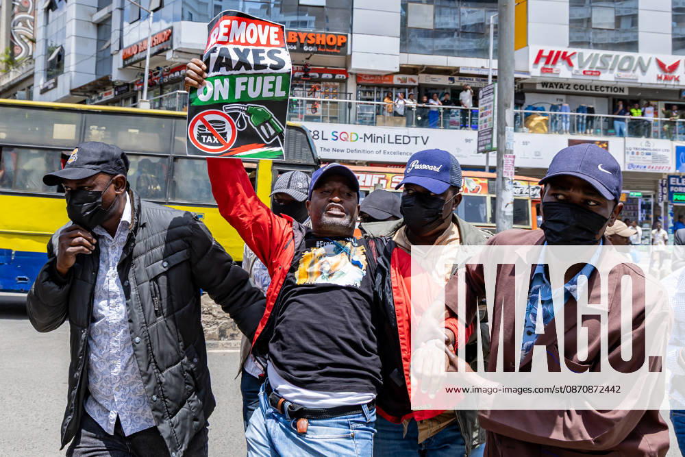 A Kenyan human rights activist is arrested during a protest. Protesters demonstrated against rising fuel prices and the cost of living in Nairobi s Central Business District, calling for lower fuel prices and the removal of fuel taxes. Nairobi Kenya - ZUMAs197 20261026_aaa_s197_318